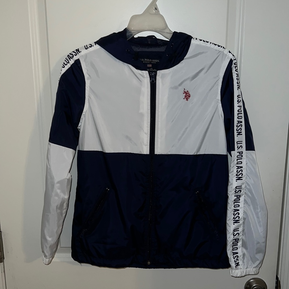 Navy blue and white polo windbreaker